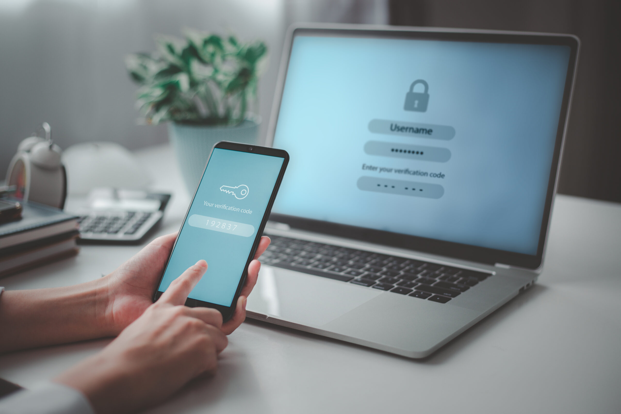 Woman hand enter a one time password for the validation process, Mobile OTP secure Verification Method, 2-Step authentication web page. Woman hand enter a one time password for the validation process, Mobile OTP secure Verification Method, 2-Step authentication web page.